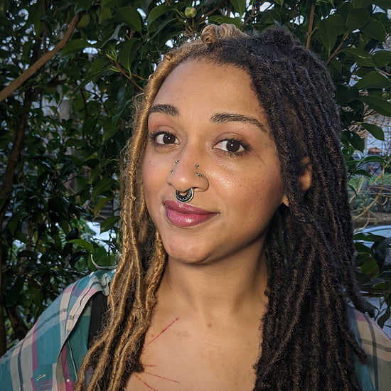 model wearing magenta lip and cheek tint